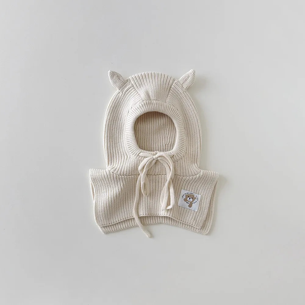 Cagoule et écharpe 2 en 1