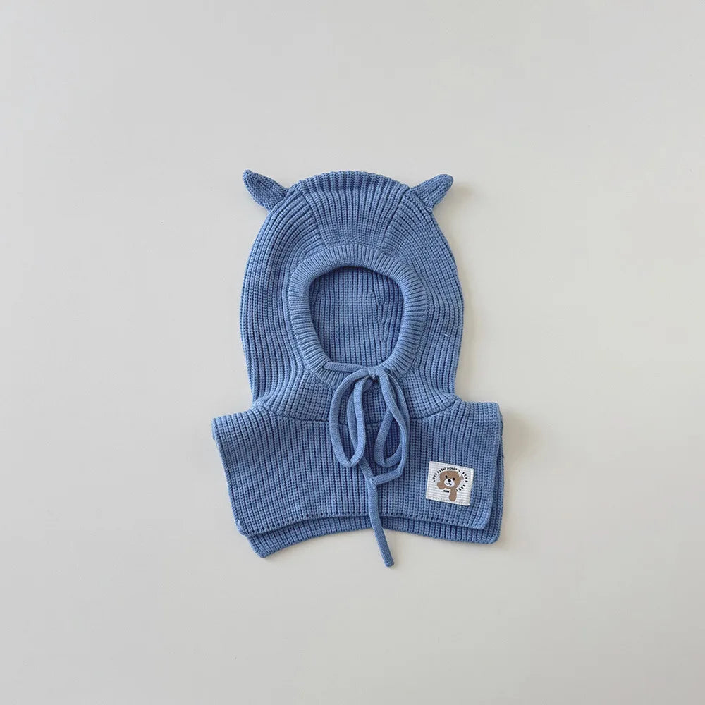 Cagoule et écharpe 2 en 1