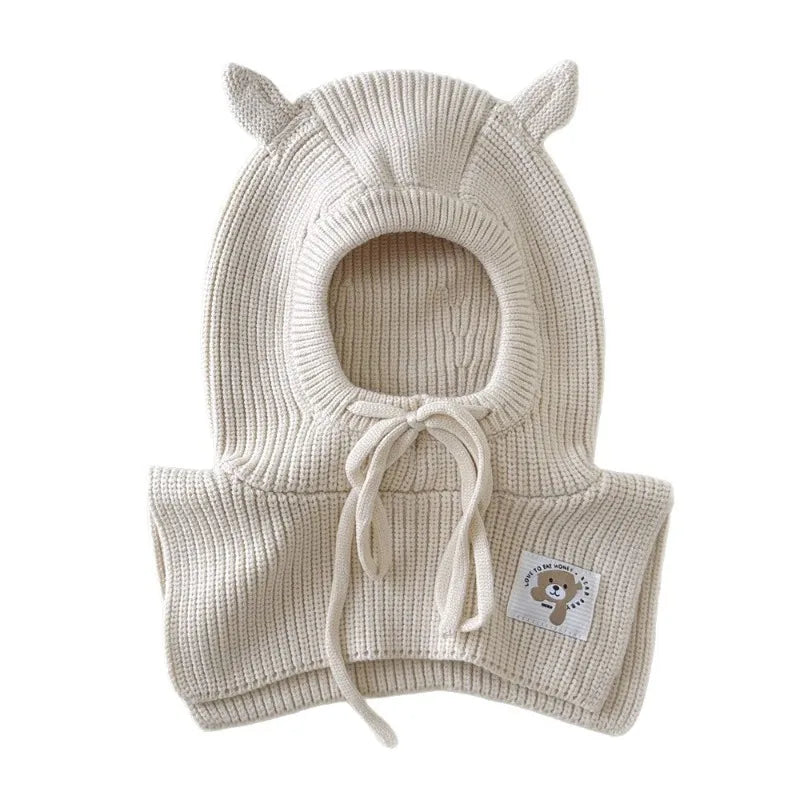 Cagoule et écharpe 2 en 1