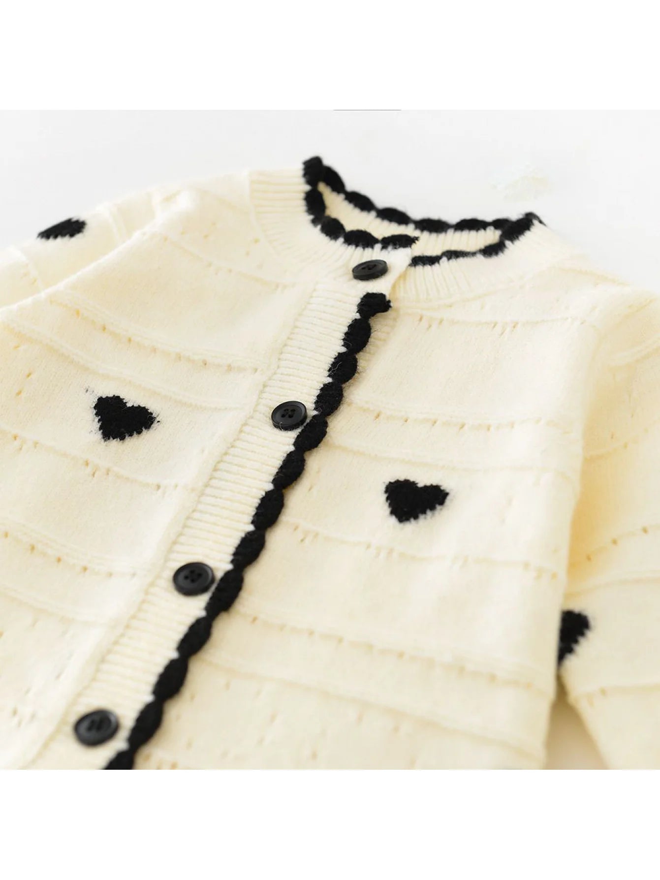 Barboteuse en maille motif