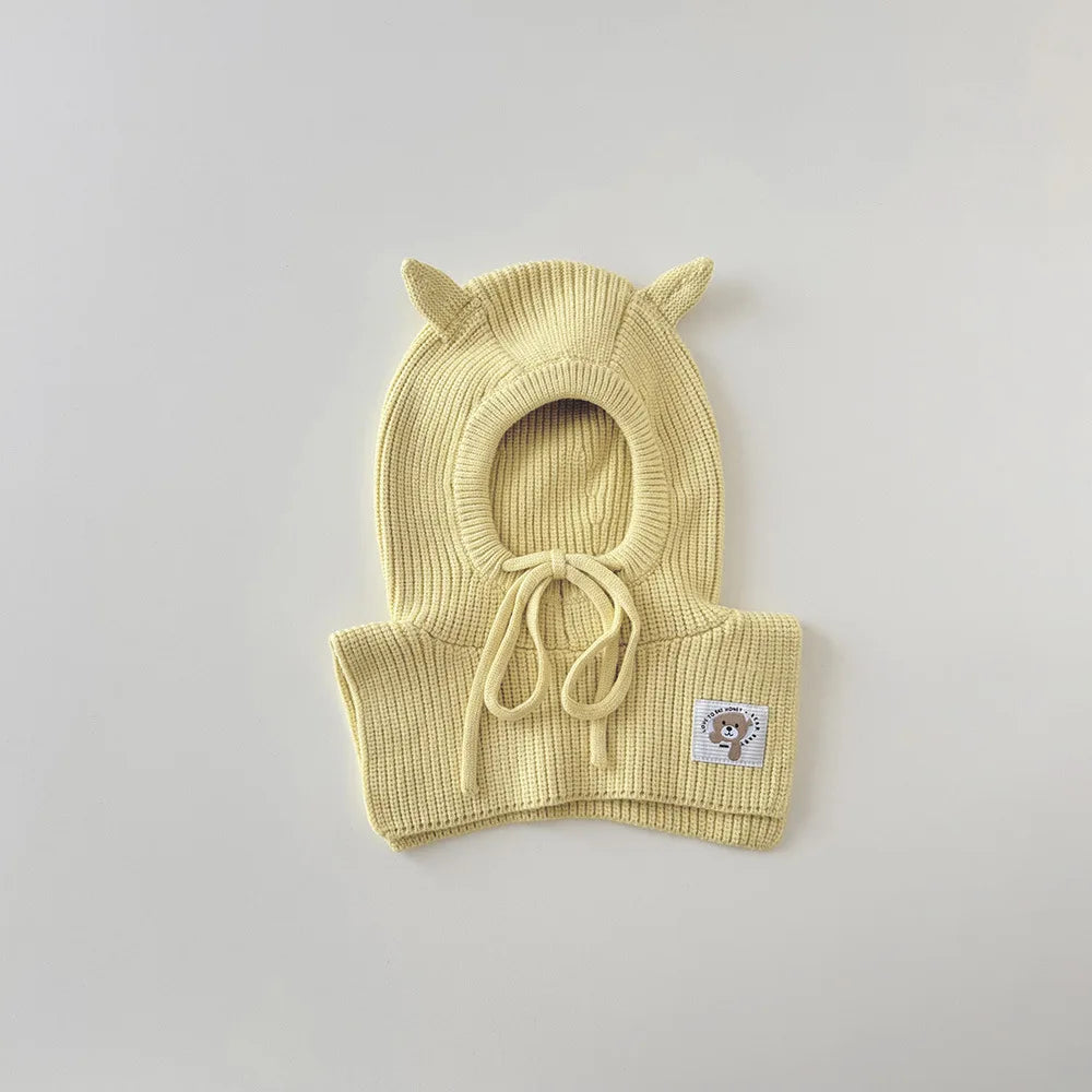 Cagoule et écharpe 2 en 1